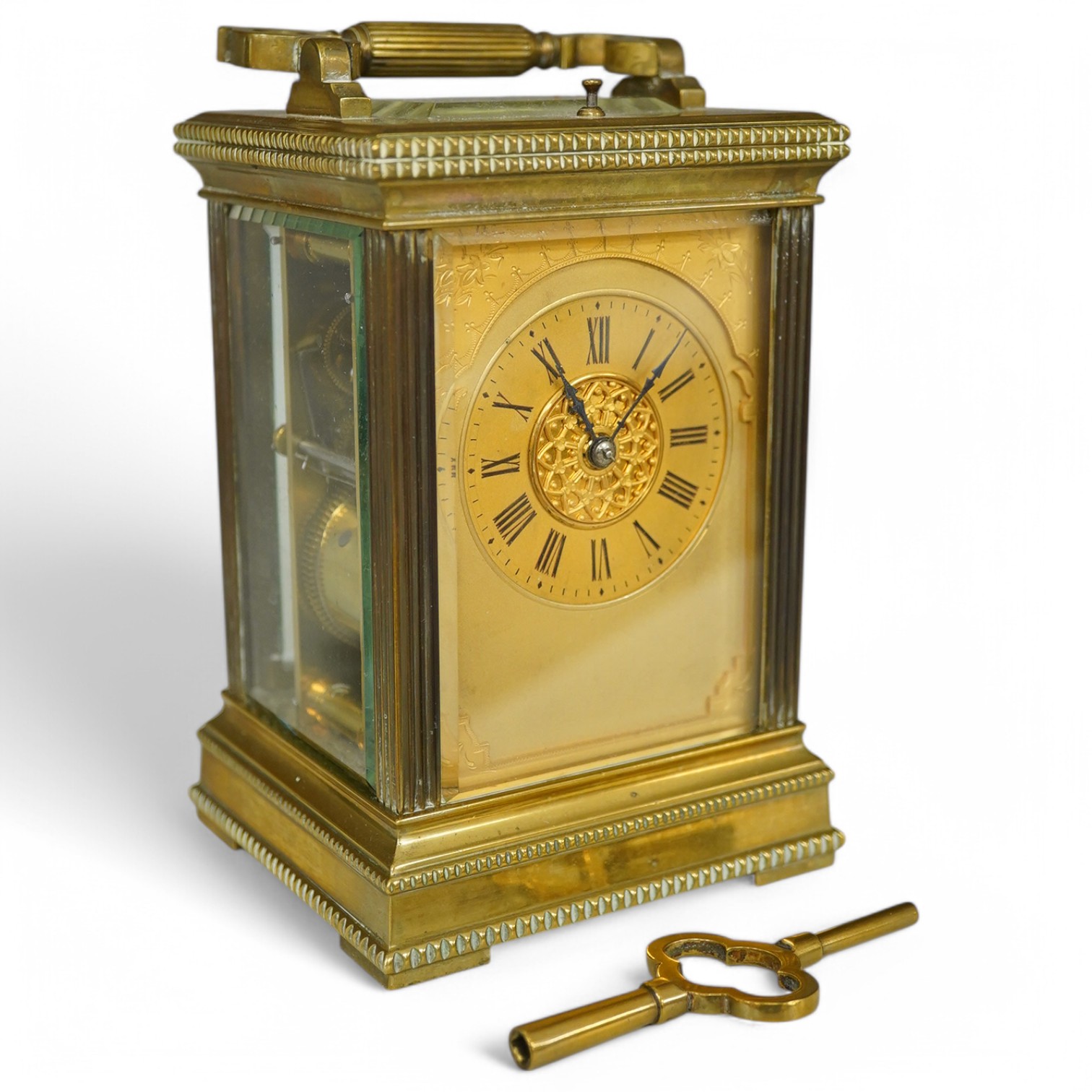 A French brass repeating carriage clock, engraved Paris to the backplate, 15cm high. Condition - good.